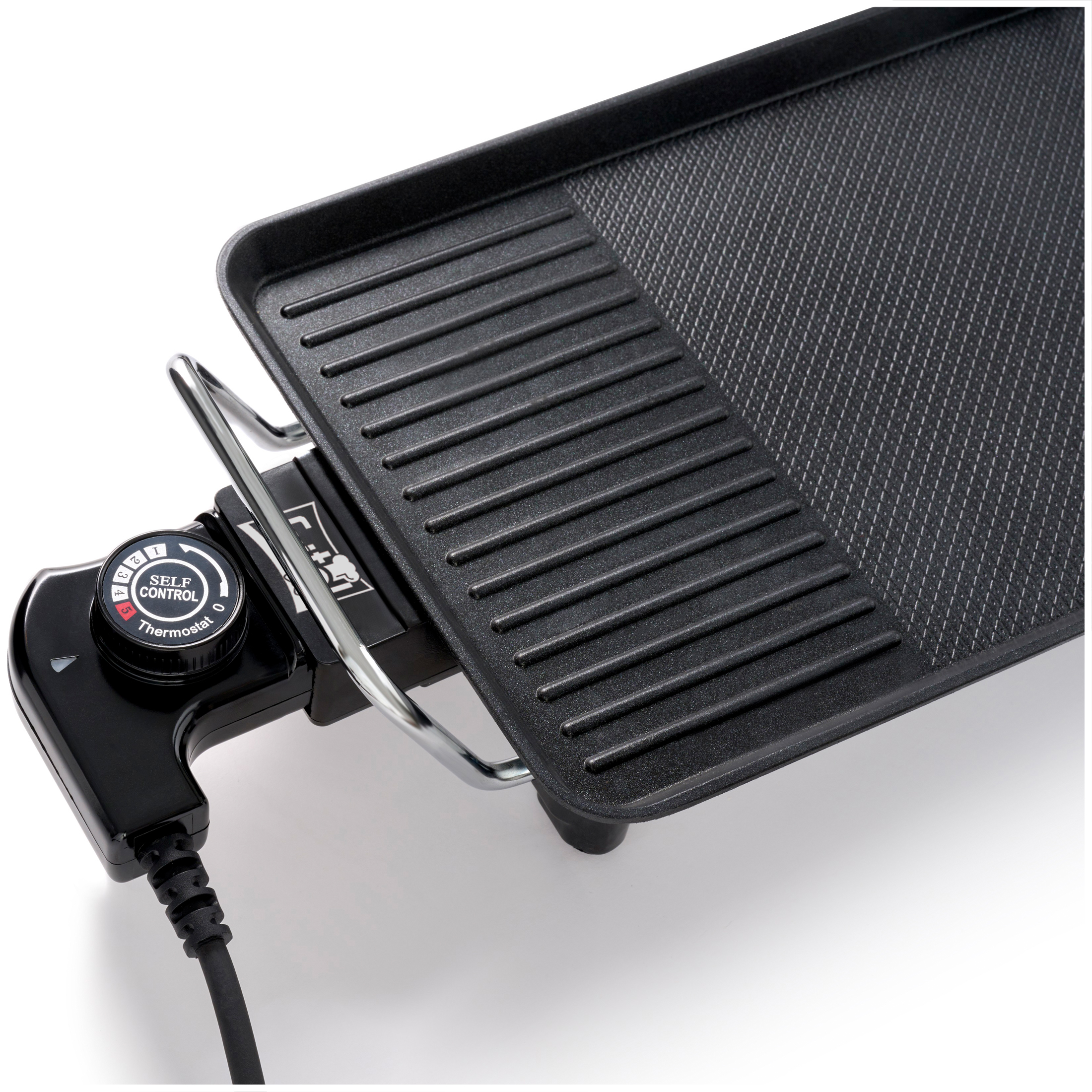 Electric grill plate with thermostat control and ribbed surface.