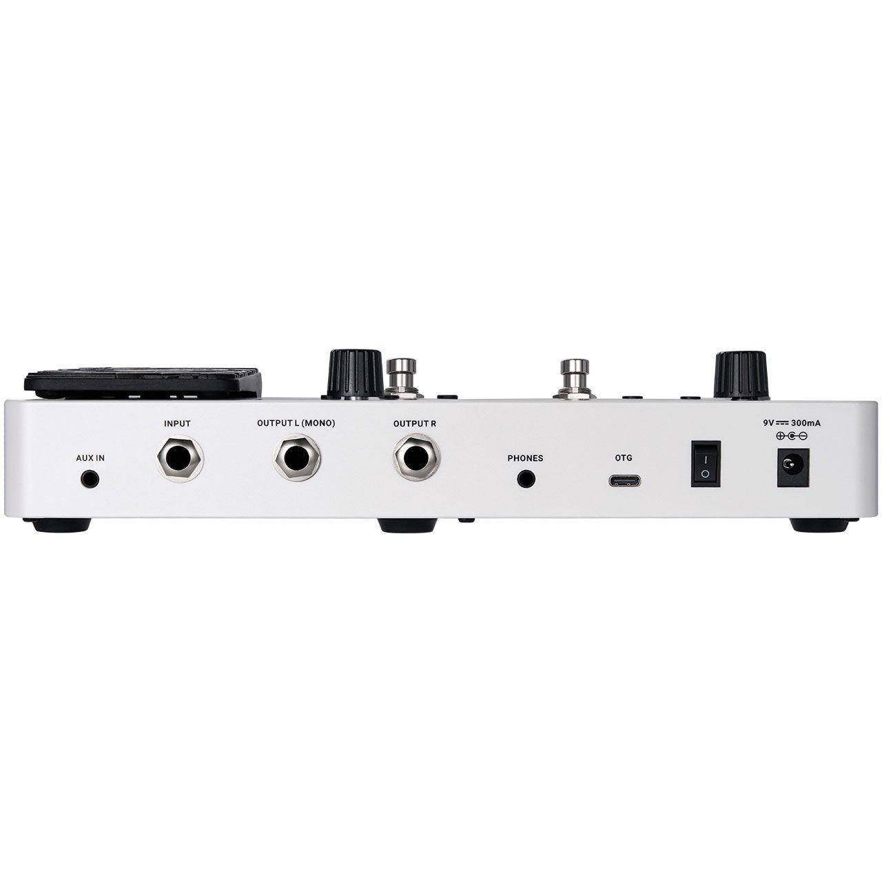 Girişler: Aux In, Input, Output L, Output R, Phones, OTG olan beyaz gitar pedalı.