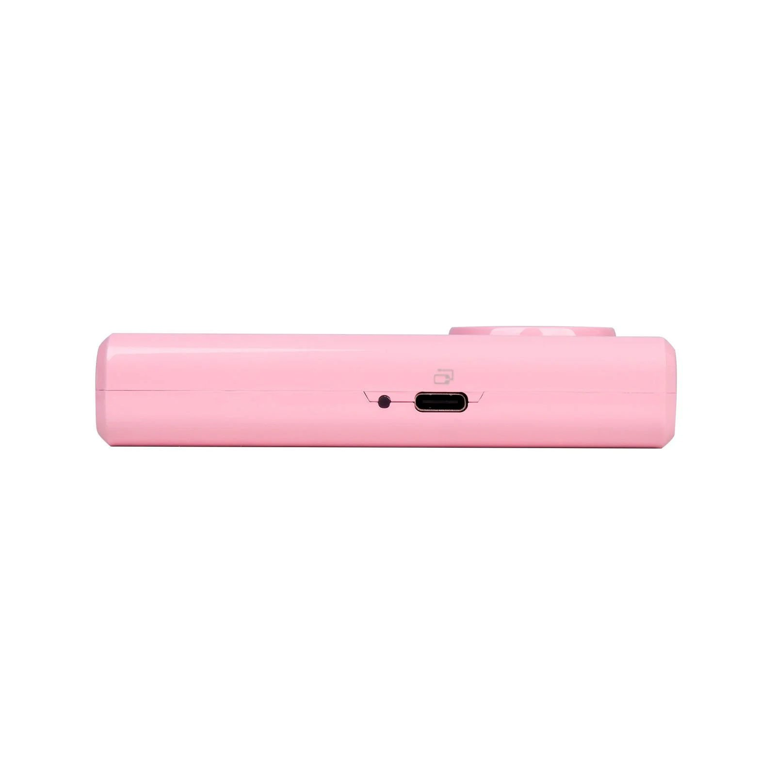 USB bağlantı noktası ve küçük bir deliği olan pembe bir kamera.