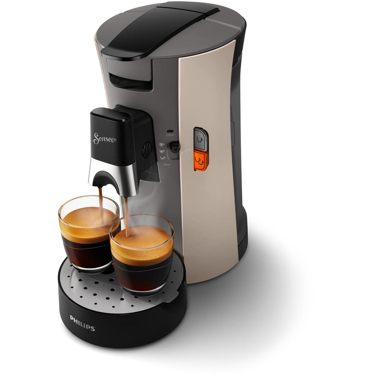 Senseo-Kaffeemaschine brüht zwei Tassen Kaffee in Gläser auf einem Sockel.