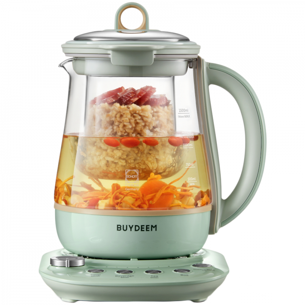 Zielony czajnik elektryczny ze szklanym korpusem, wypełniony owsem, jagodami goji i skórką pomarańczową.