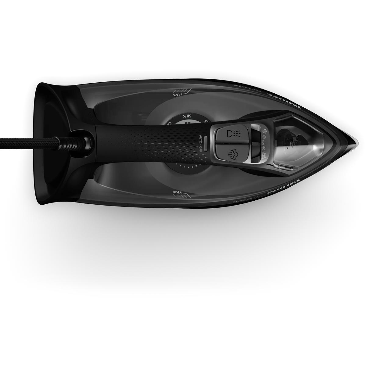 Plancha de vapor negra con depósito de agua y controles.