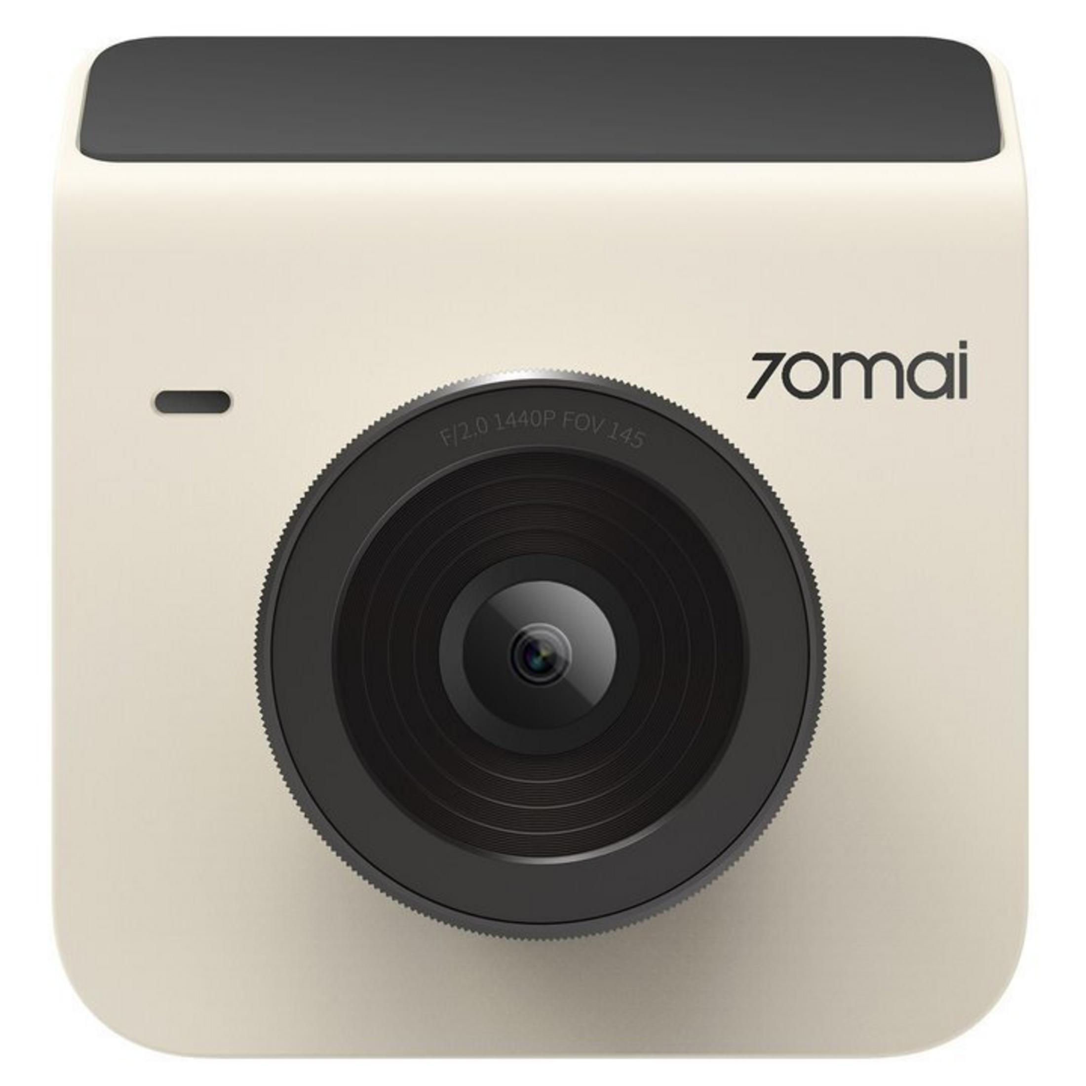 Una dashcam color crema con parte superiore nera e obiettivo grande.