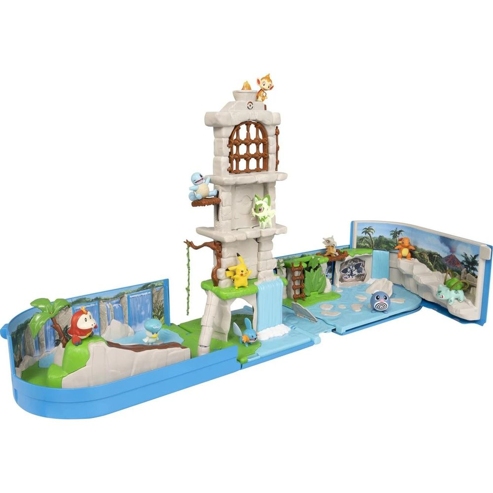 Ein Pokémon-Spielset mit Turm, Wasserfällen und verschiedenen Figuren auf einer blau-grünen Basis.