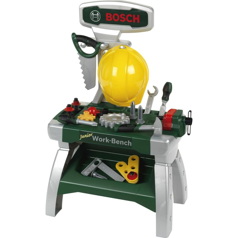 Bosch Junior Werkbank mit gelbem Helm, Werkzeugen und Zubehör vor weißem Hintergrund.