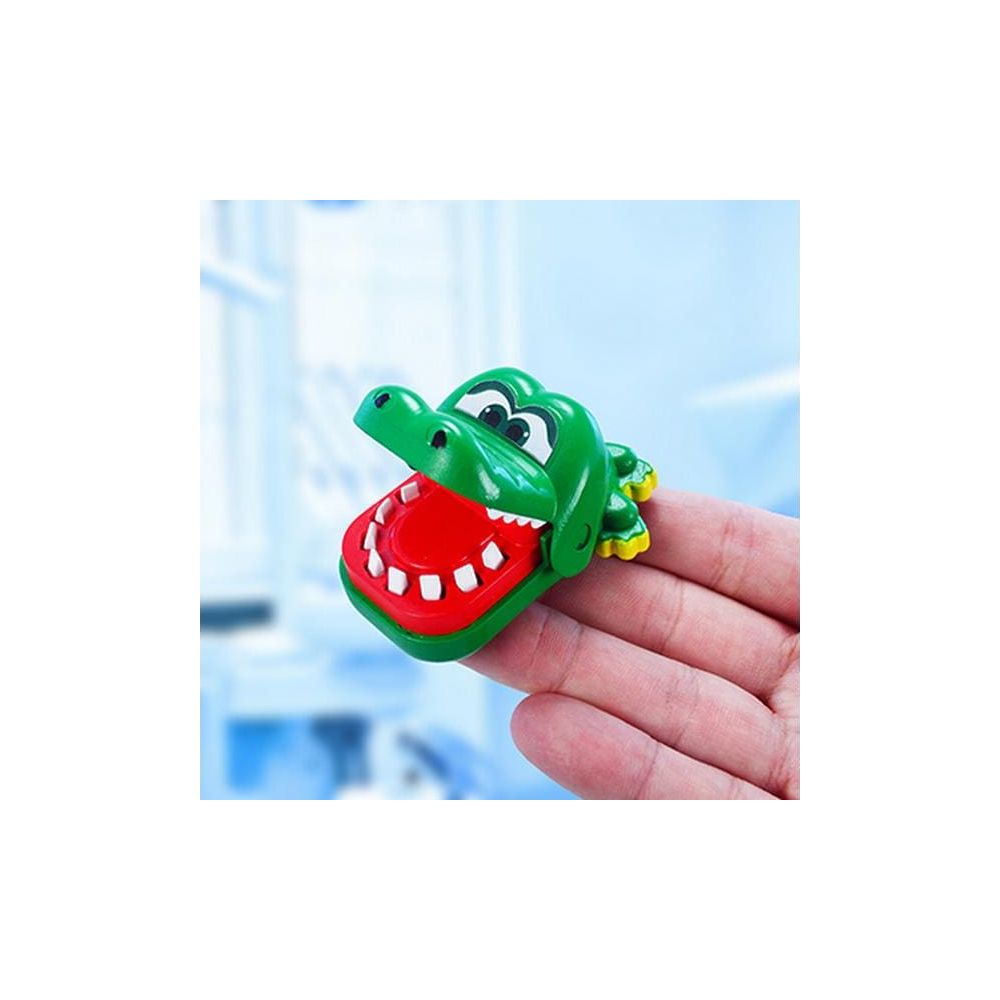 Pupazzo da dito coccodrillo verde con bocca aperta, interno rosso e denti bianchi.