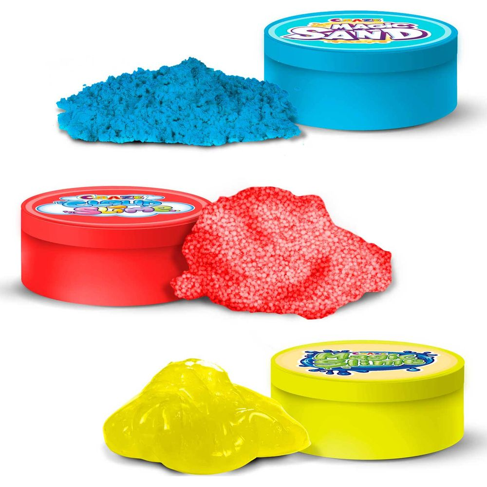 Contenitori blu, rossi e gialli di sabbia magica con sabbia.