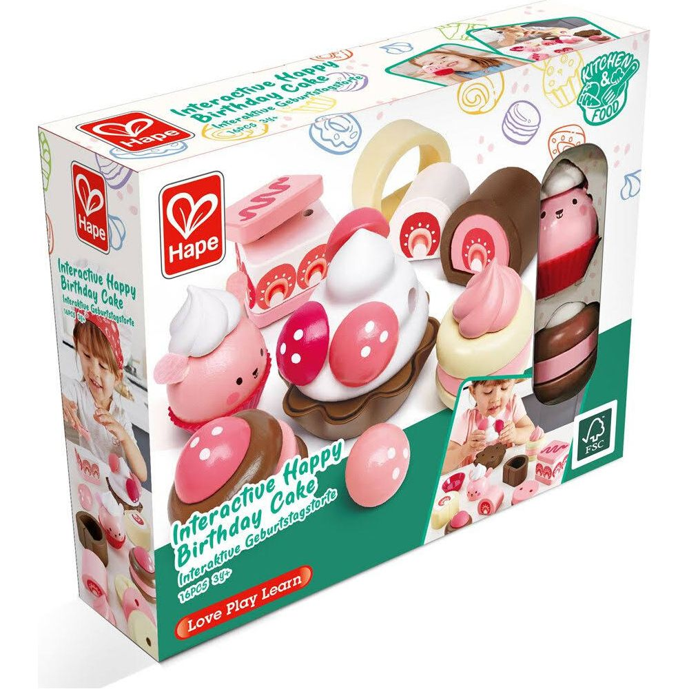 Juguete de pastel de cumpleaños Hape con piezas de pastel rosas y marrones.