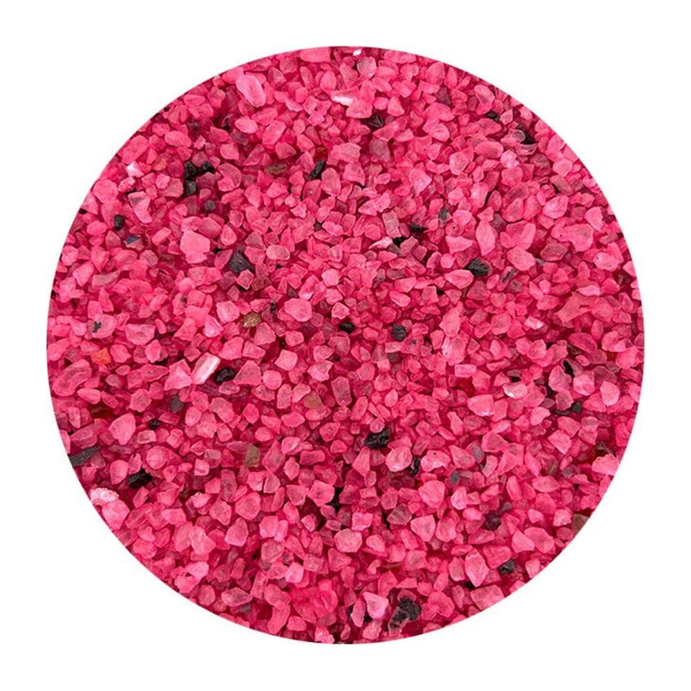 Piccola ghiaia rosa irregolare con alcune particelle scure.