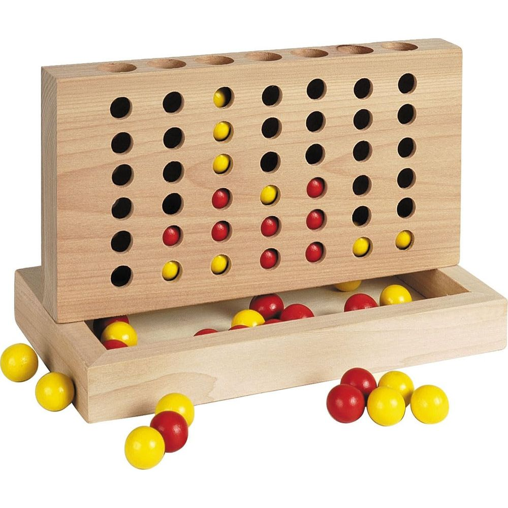 Ein Holzspiel mit roten und gelben Kugeln, das auf einem Tisch liegt.