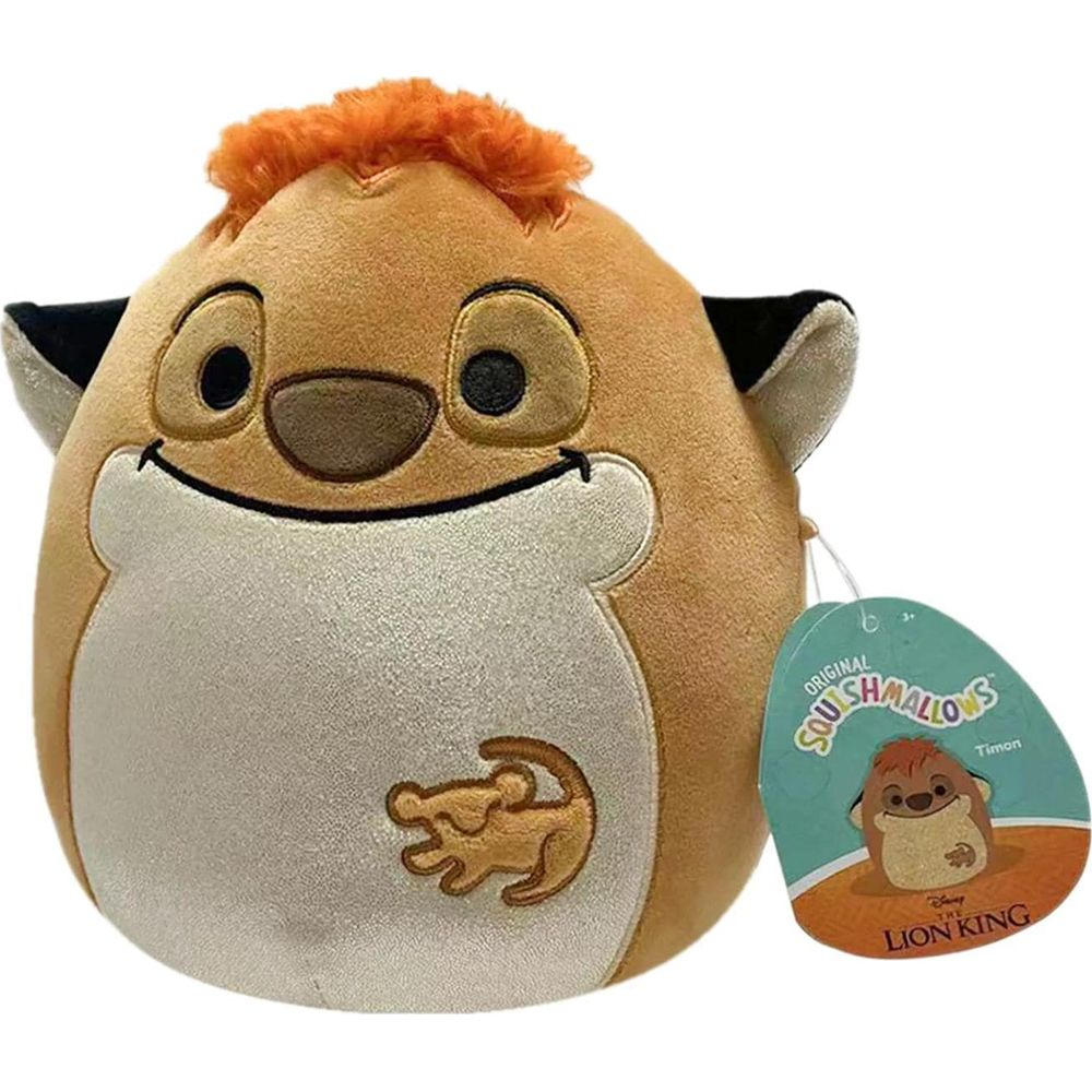 Une peluche ronde et beige de Timon du Roi Lion, avec des cheveux orange et une étiquette.