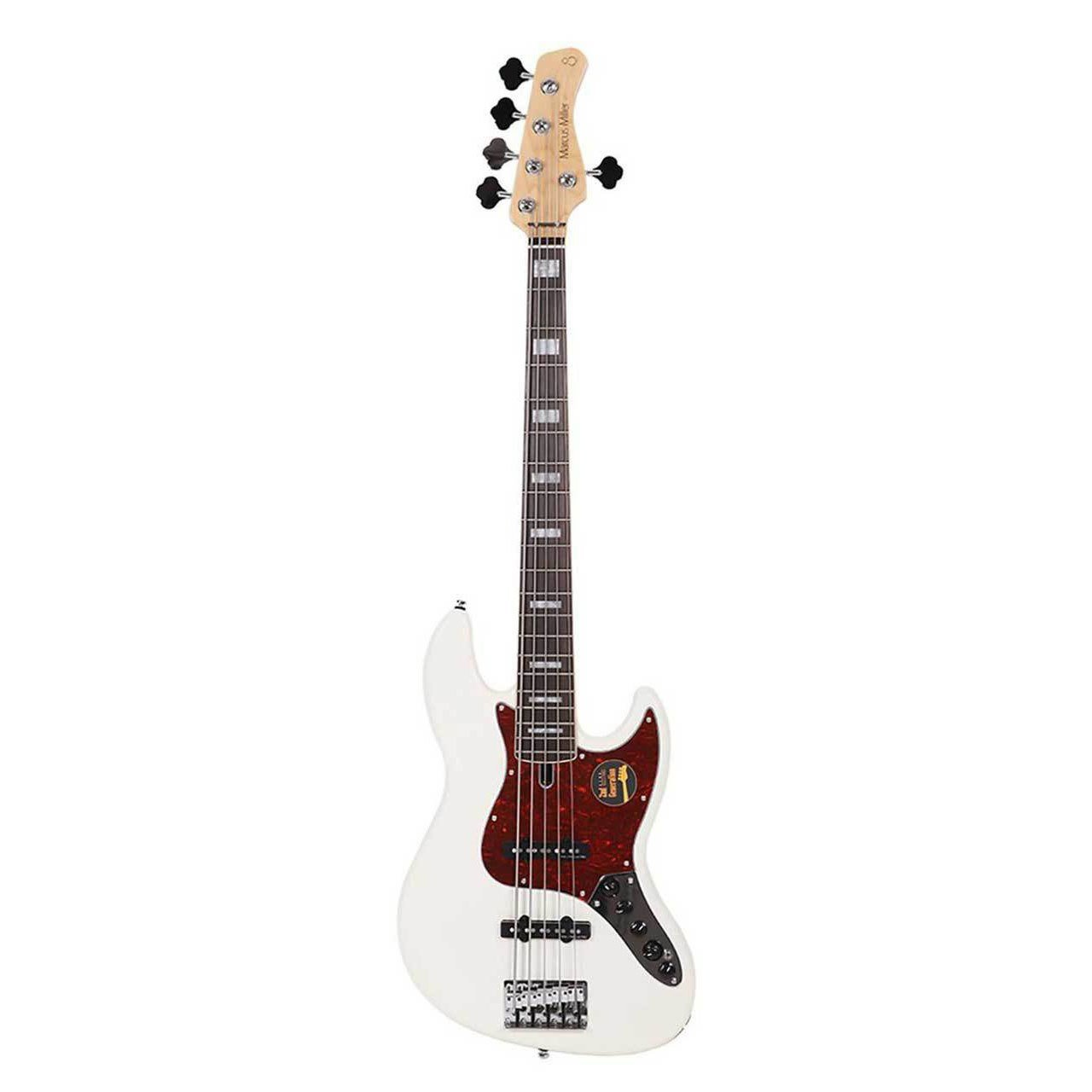 Kaplumbağa kabuğu pena ve gümüş donanıma sahip beyaz elektro bas gitar.
