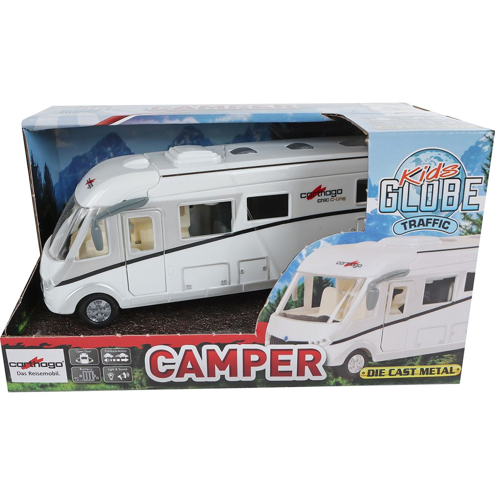 Ein weißes Wohnmobil-Spielzeug in einer Verpackung mit Berglandschaft.