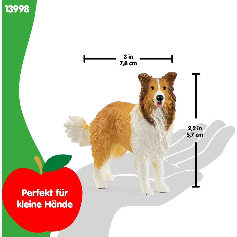 Un chien Collie jouet se tient sur un graphique de main. Mesures: 7,8 cm de long, 5,7 cm de haut.