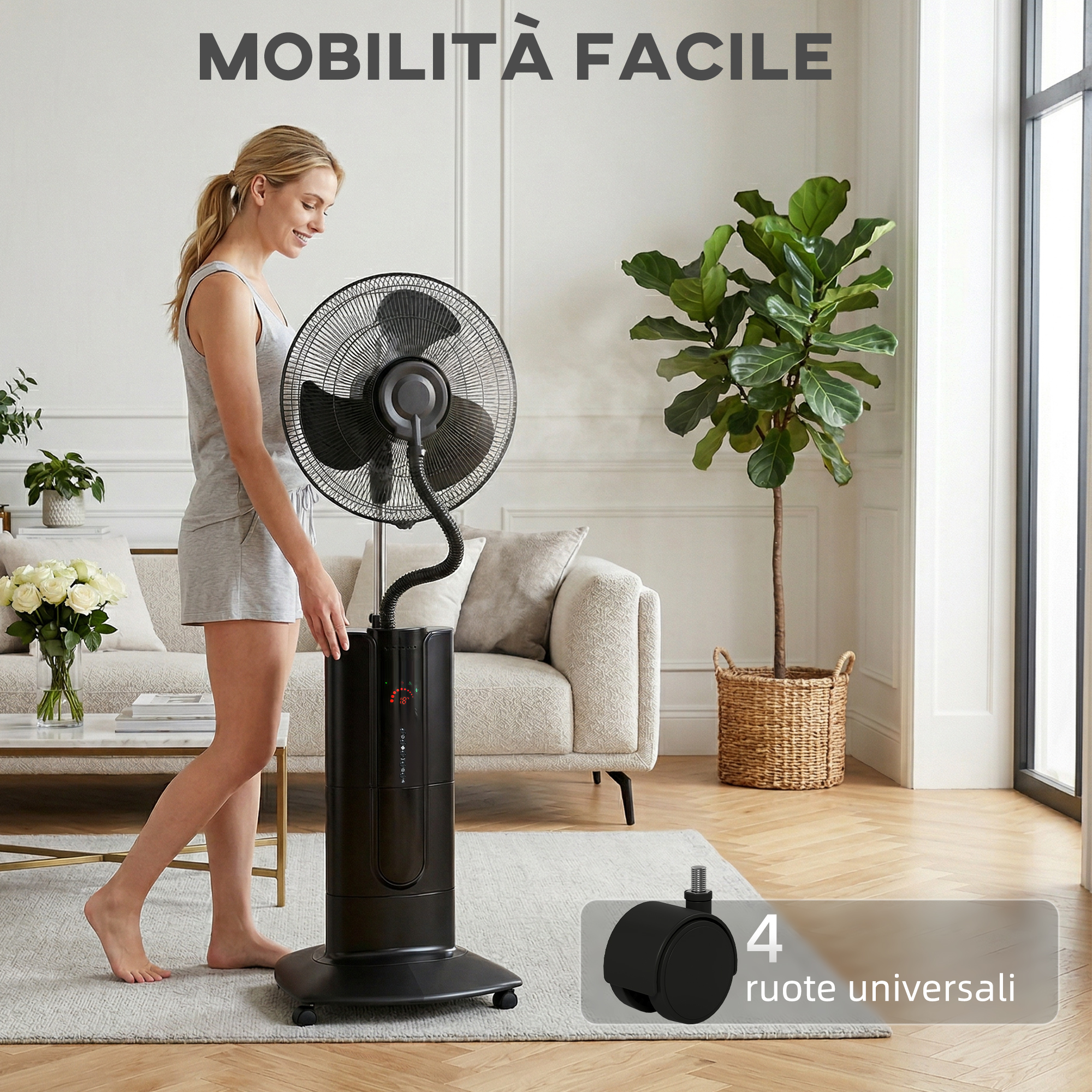 Una donna è accanto a un ventilatore da terra nero nebulizzatore in un soggiorno.
