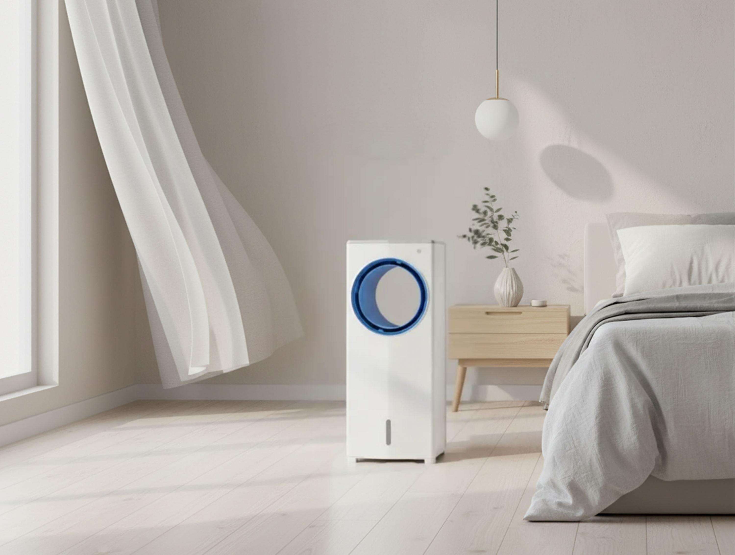 Un refrigeratore d'aria bianco con anello blu accanto a un letto con comodino in legno.