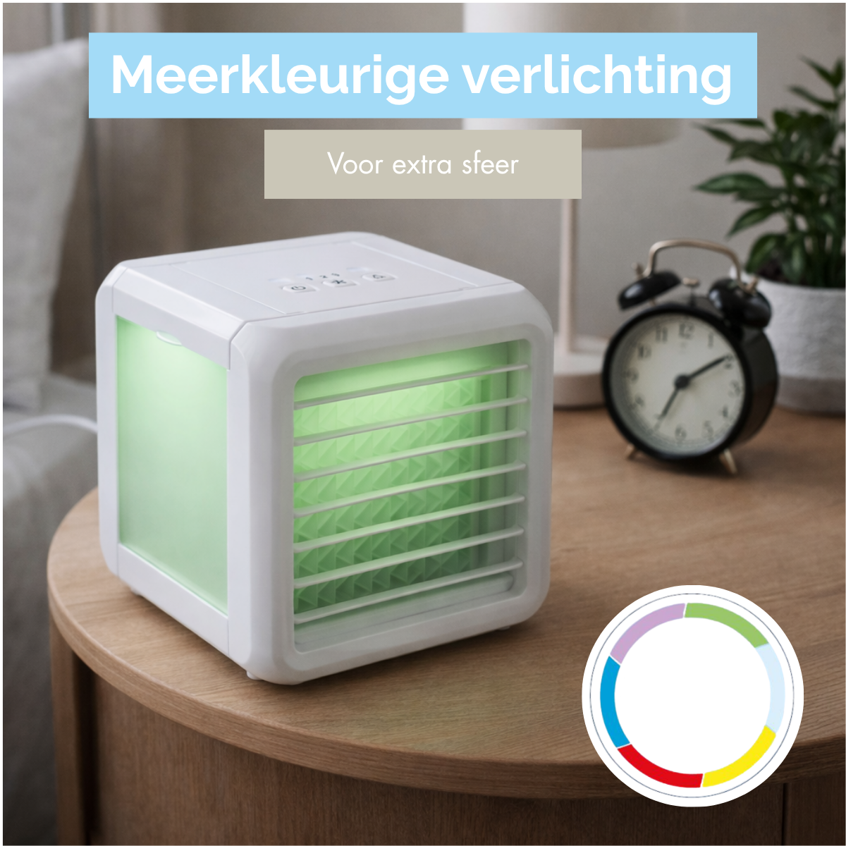 A white mini air cooler with green lighting sits on a nightstand.