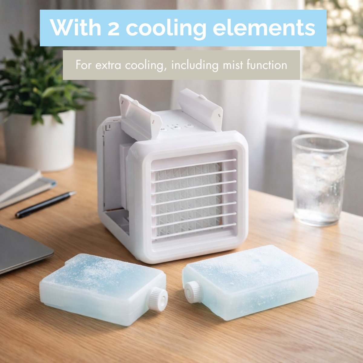 White portable cooler with two ice packs on a desk. Includes text 'With 2 cooling elements.'
