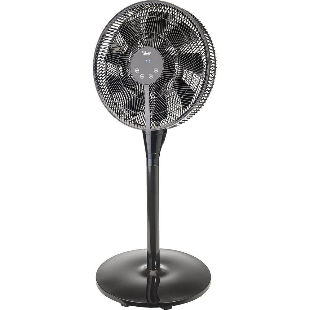 A black pedestal fan with a digital display stands on a round base.