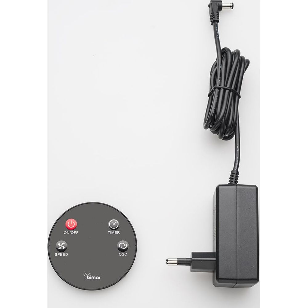 A black round fan controller with buttons and a black power adapter with cord on white background.