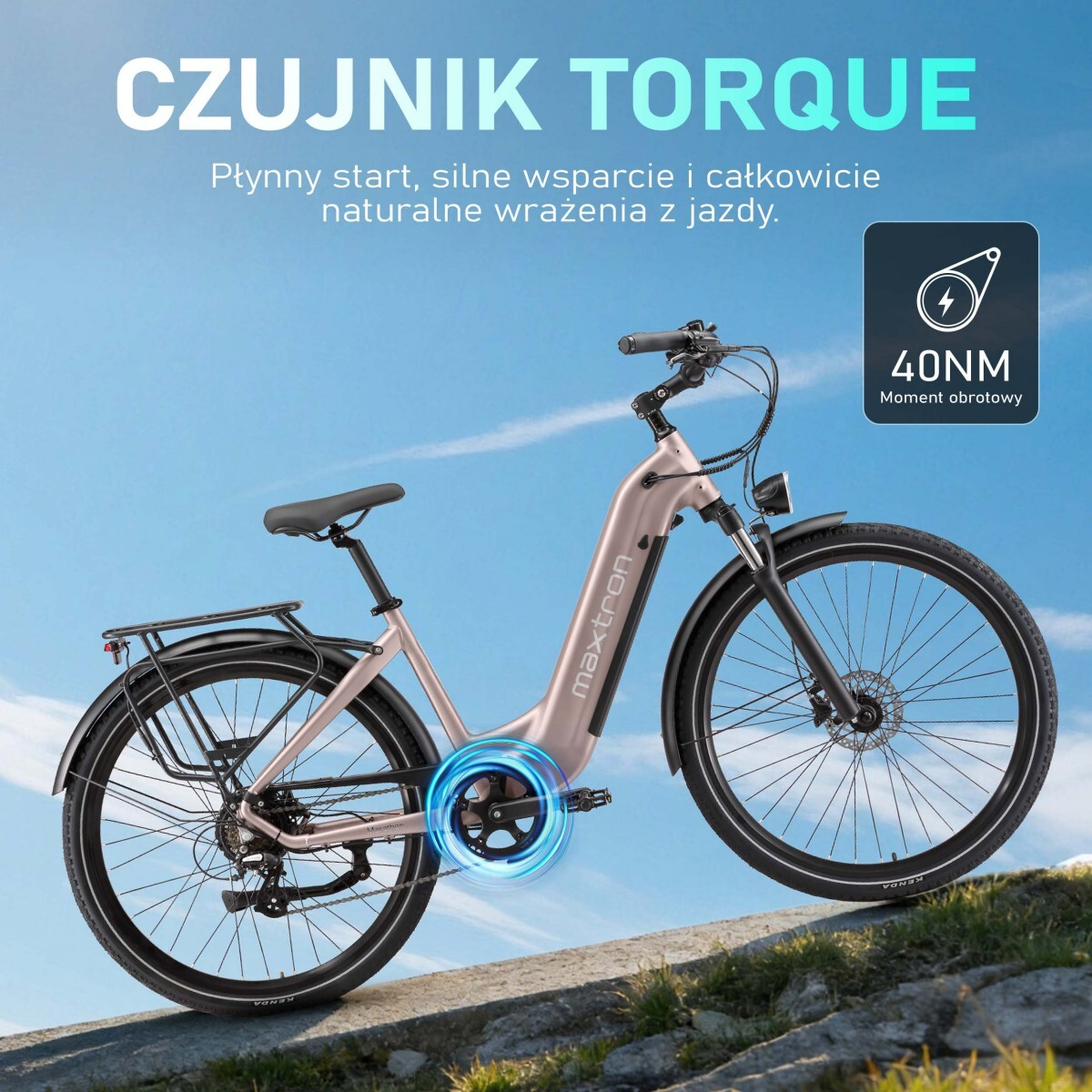 Różowo-złoty rower elektryczny z napisem "40NM moment obrotowy" na zewnątrz.