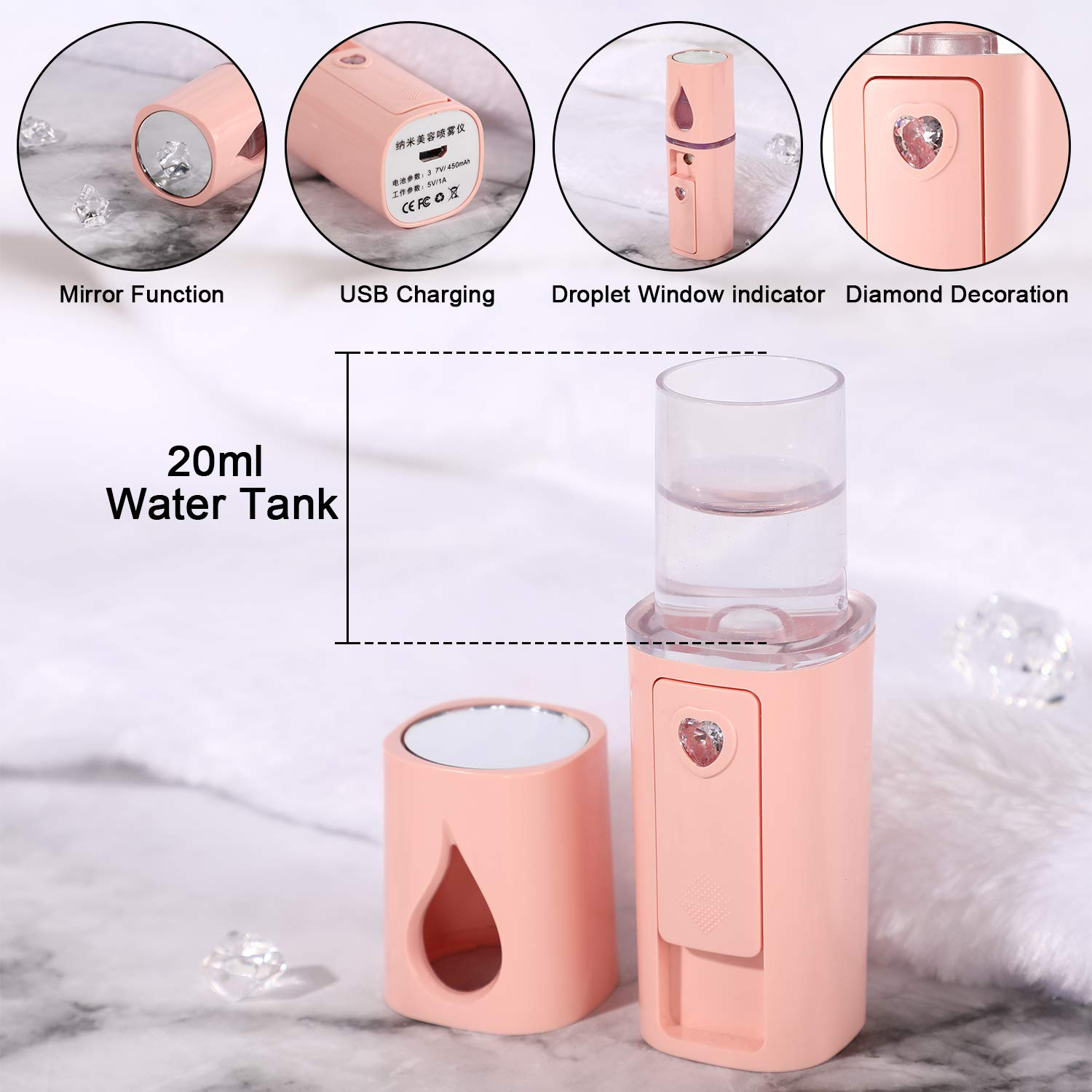 Ein rosa Nano-Gesichtsspray-Gerät mit Spiegel, USB-Anschluss und Wassertank.