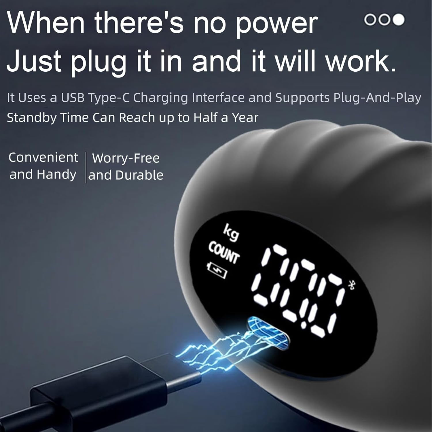 Ein schwarzes Gerät mit einem USB-C-Anschluss, der mit Strom versorgt wird. Digitale Anzeige.