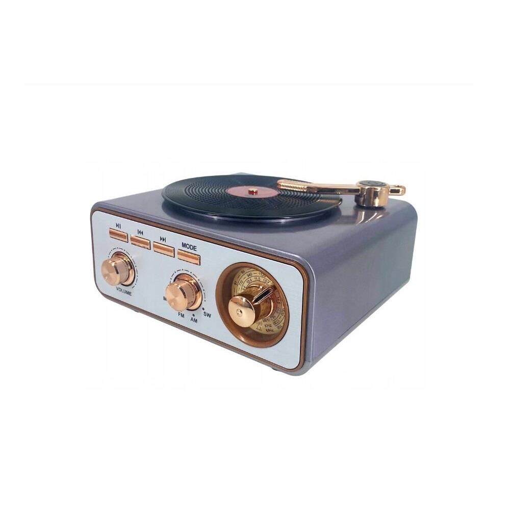 Altın vurgulu gri pikap, müzik ve radyo fonksiyonlarına sahip.