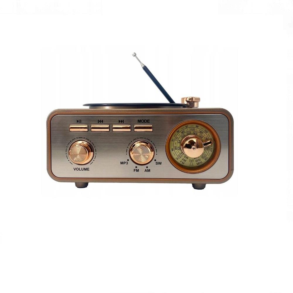 Gümüş düğmeli ve uzatılabilir antenli kahverengi retro radyo.