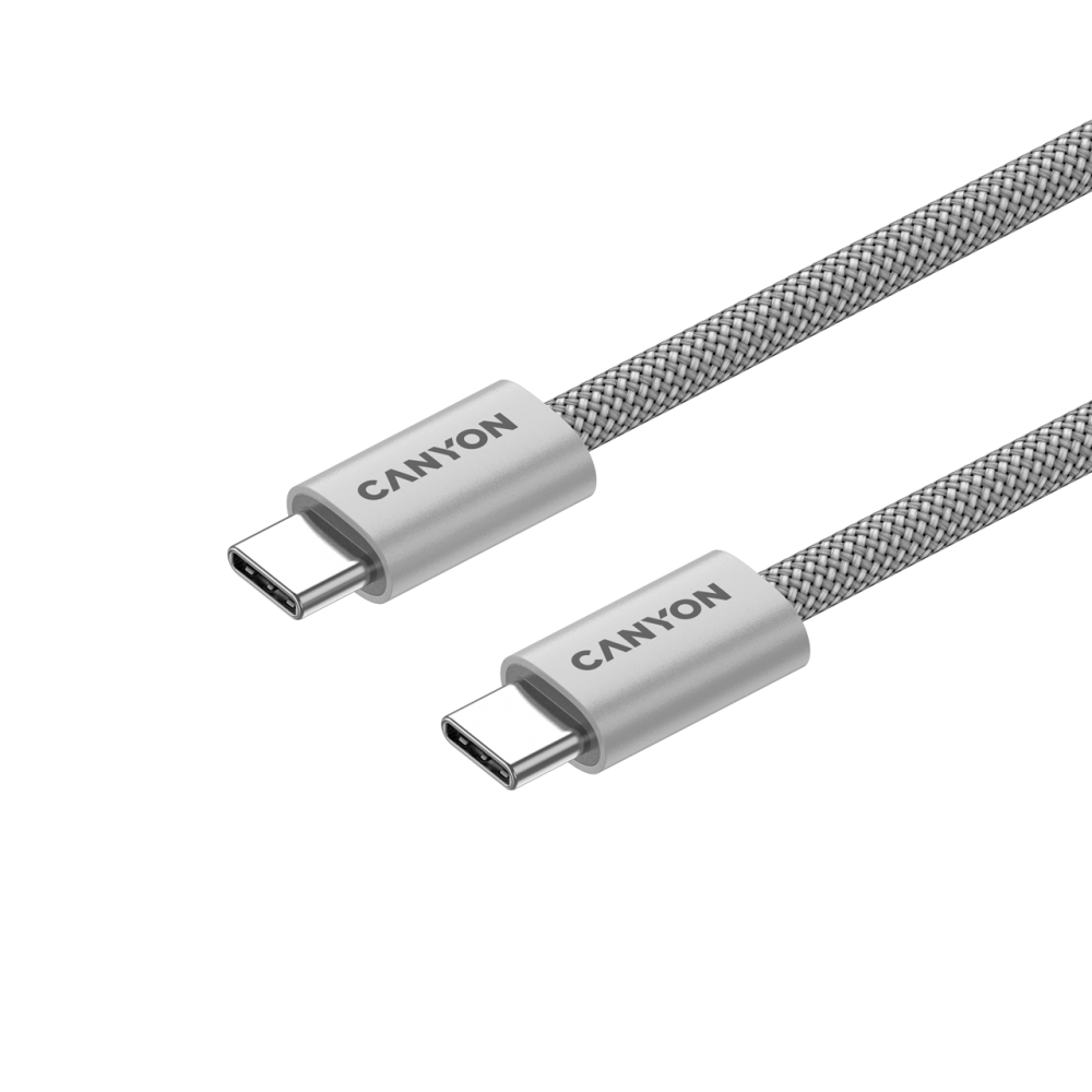 Dwa kable USB-C ze srebrnymi plecionymi przewodami i srebrnymi złączami, logo Canyon.
