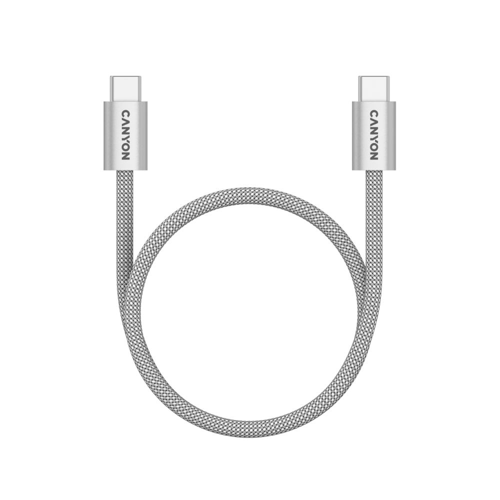 Srebrny kabel USB-C z napisem CANYON, zgięty w okrąg.