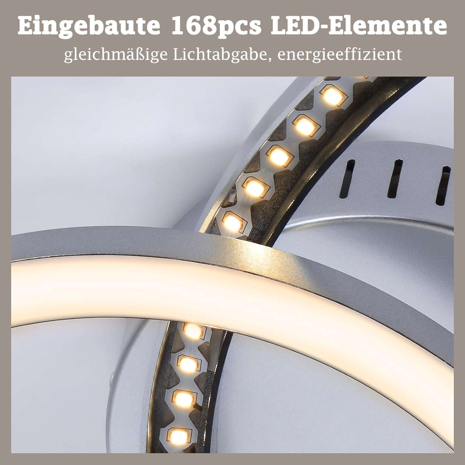 Primo piano di una lampada moderna con 168 elementi LED e anelli argentati.