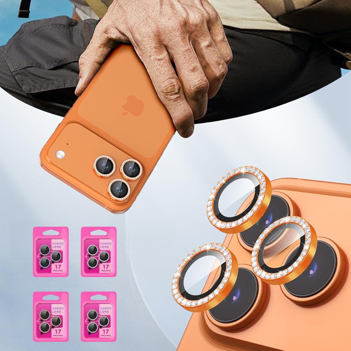 Smartphone arancione con tre lenti per fotocamera ingioiellate e quattro confezioni.