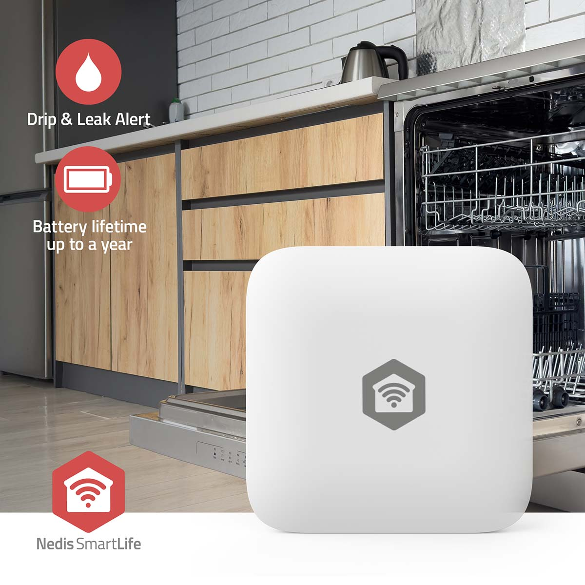 A white smart home sensor sits in front of an open dishwasher in a kitchen.