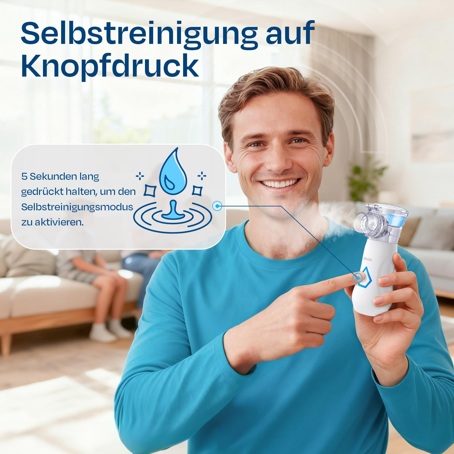 Mann zeigt auf Vernebler; Selbst-Reinigung per Knopfdruck wird erklärt.