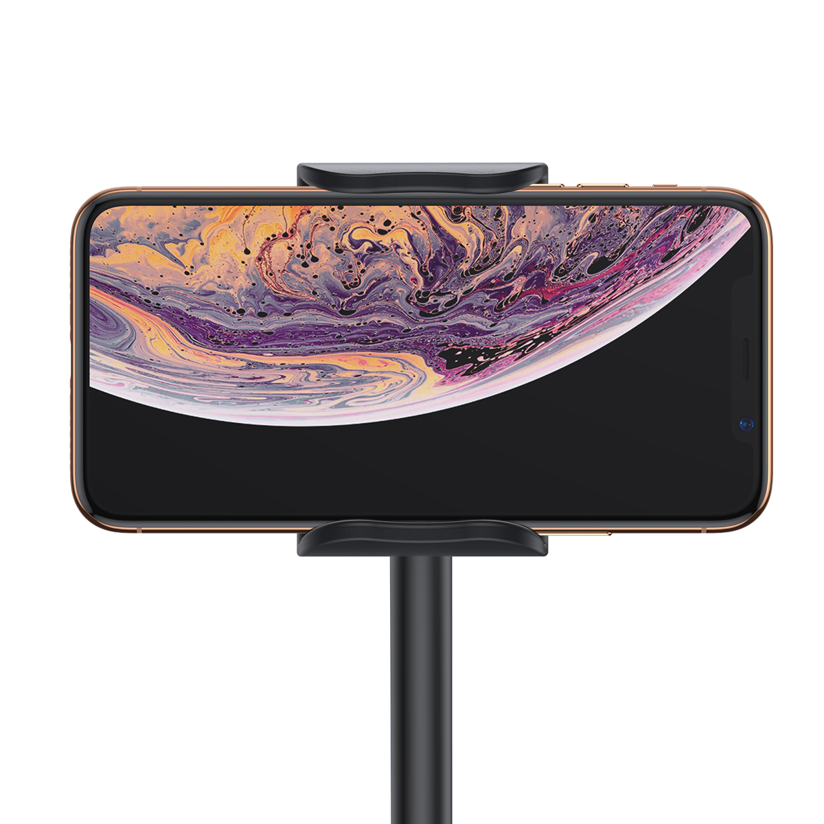Soyut duvar kağıdı gösteren siyah tutucuda altın rengi iPhone.