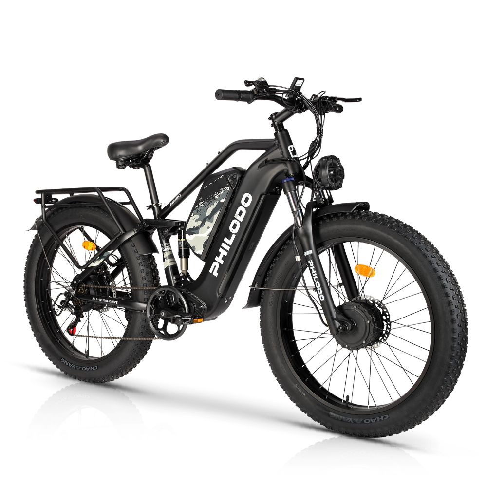 Bicicletta elettrica nera con pneumatici larghi e sospensioni, su sfondo bianco.