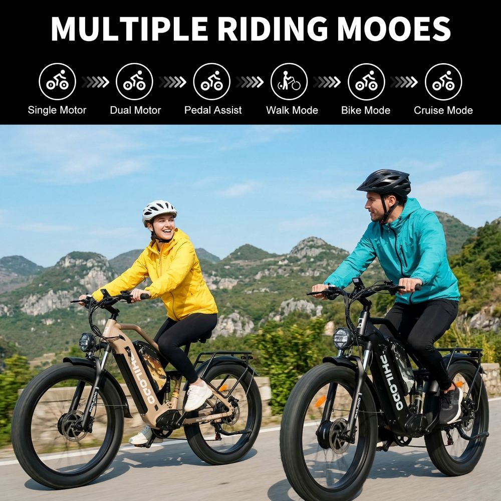 Uomo e donna guidano e-bike in paesaggio montuoso con testo 'Multiple Riding Modes'