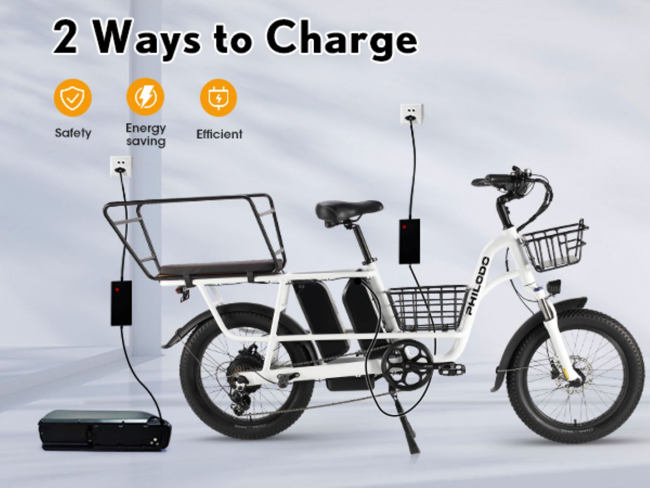 Bicicleta eléctrica de carga blanca con dos baterías, cargando por enchufe y unidad externa.