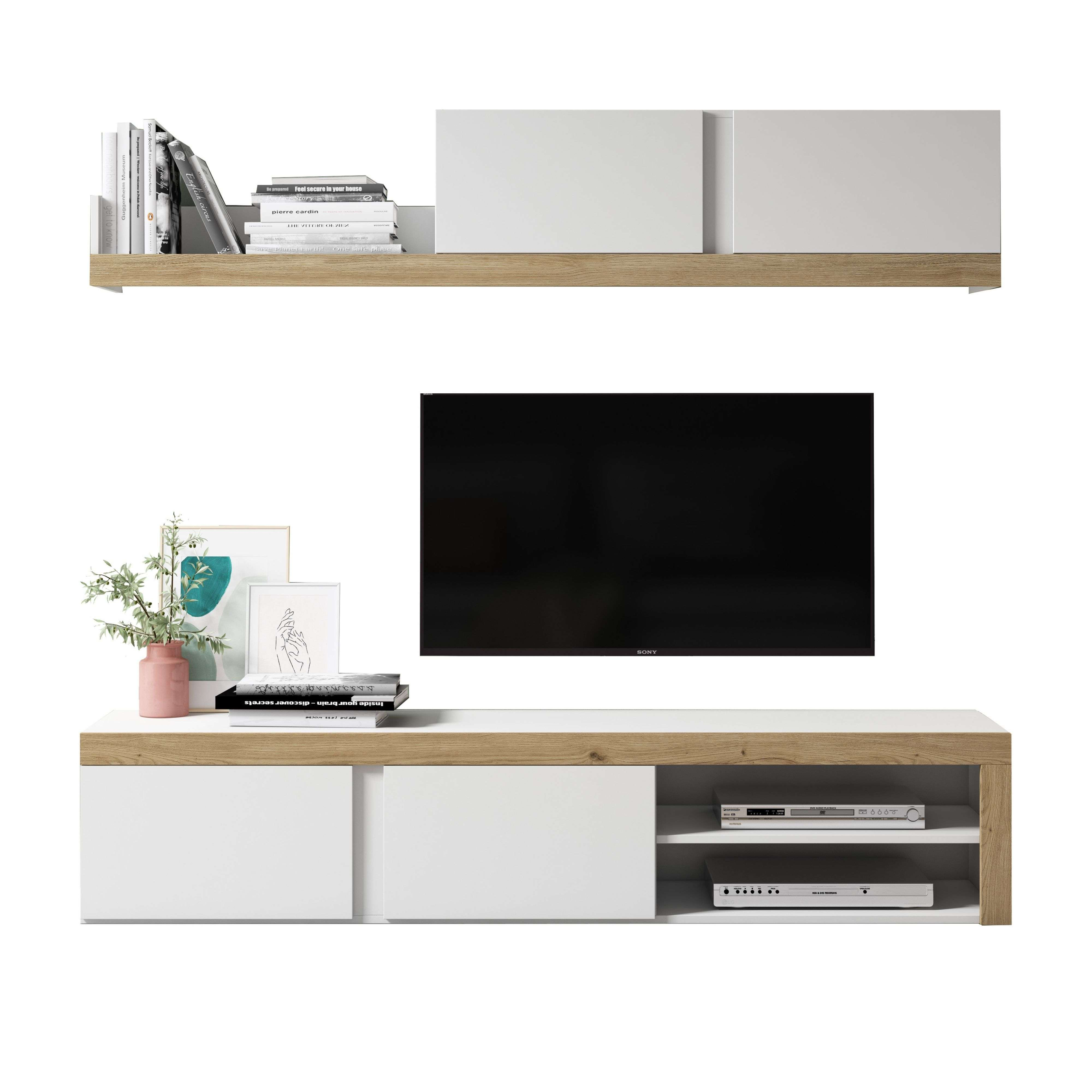 Un mueble de TV con libros, cuadros, jarrón y televisión.