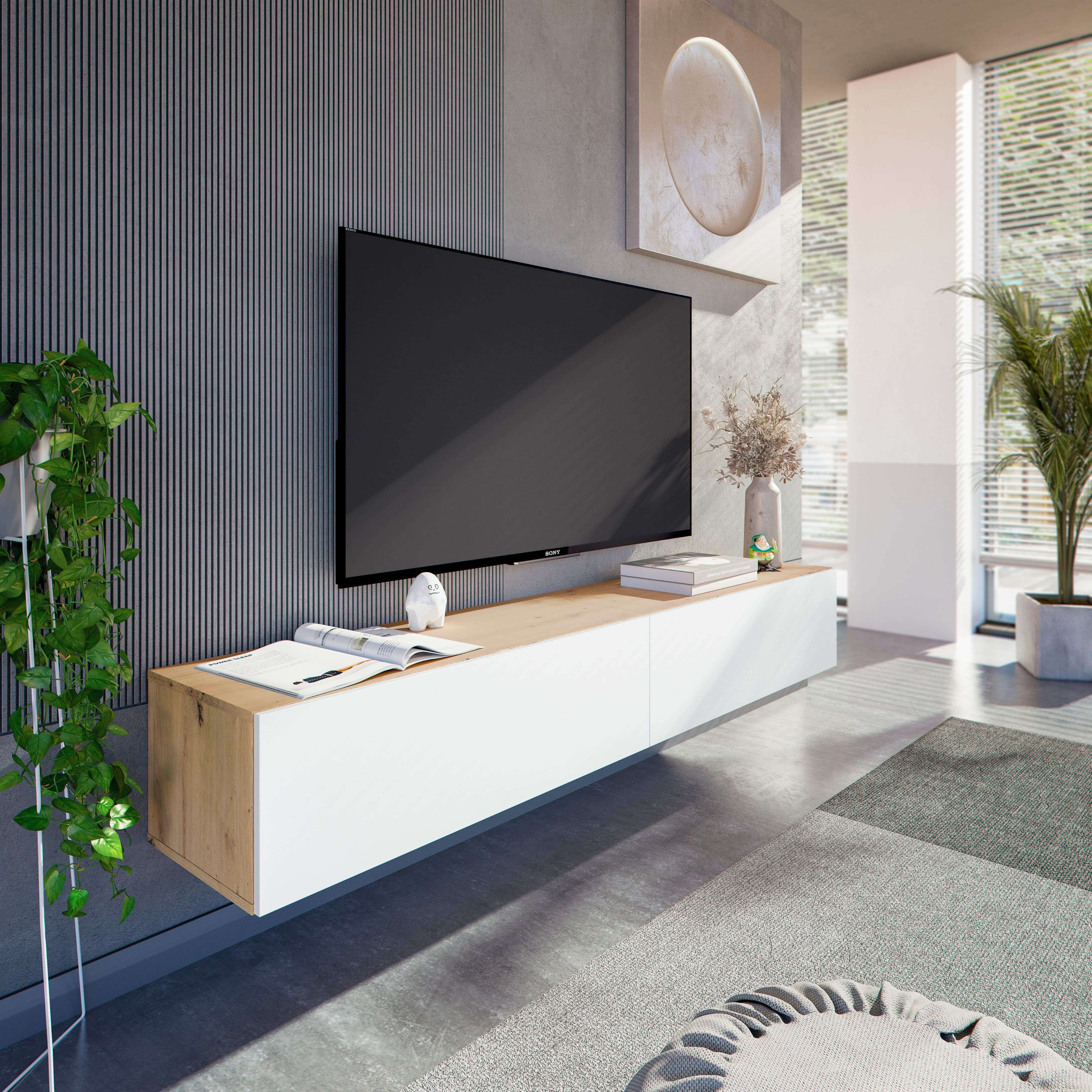 Una sala de estar moderna con TV, aparador, planta y ventana.