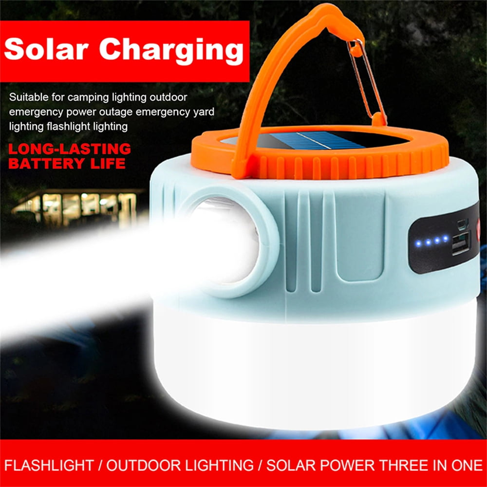 Eine blaue Laterne mit orangefarbenem Griff leuchtet hell. Solarpanel oben.