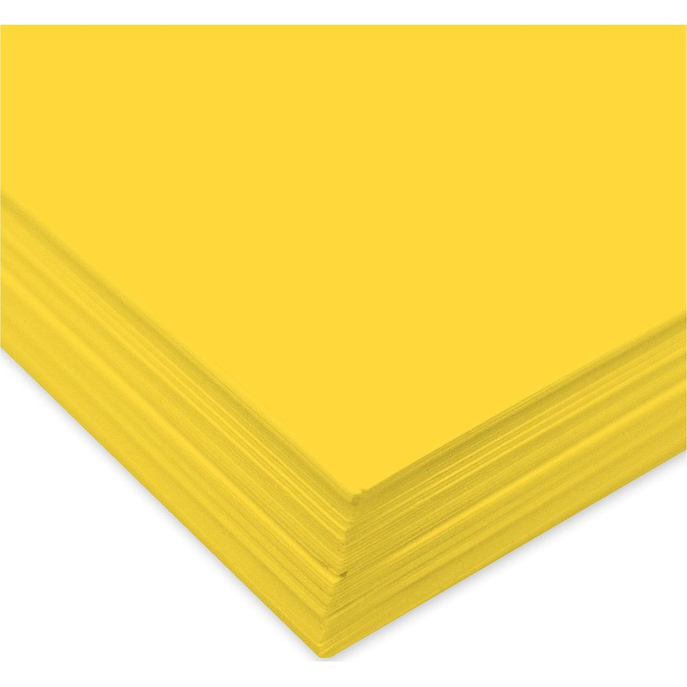 Ein Stapel leuchtend gelber Papierbögen, von unten betrachtet, mit scharfen Kanten.