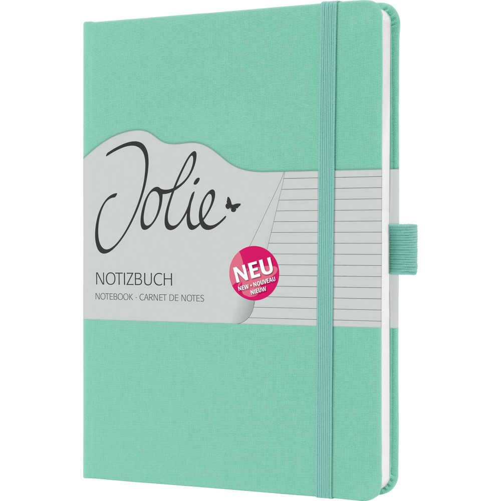 Un carnet turquoise avec un élastique. La couverture indique 'Jolie' et 'Notizbuch'.