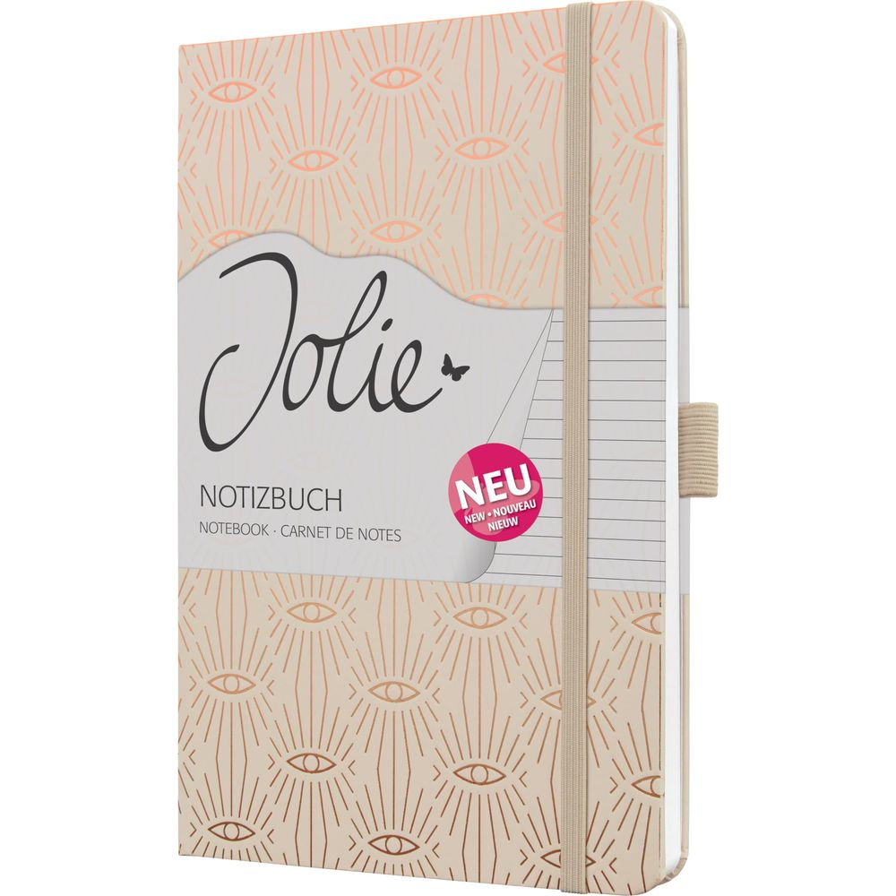 Un carnet avec le texte "Jolie" et un autocollant "Neu" sur fond beige clair.