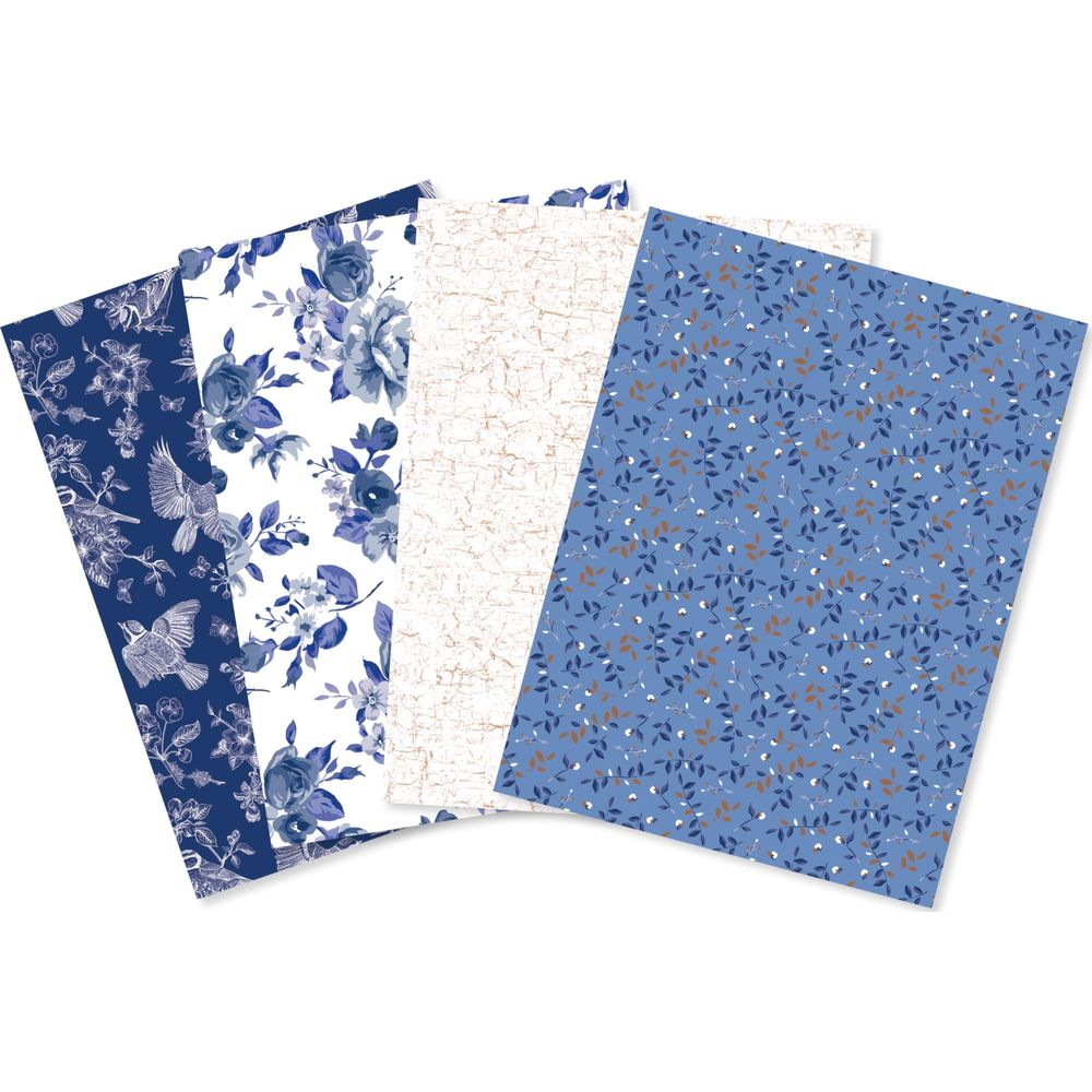 Quattro carte fantasia: uccelli, fiori, texture screpolata, piccole foglie.
