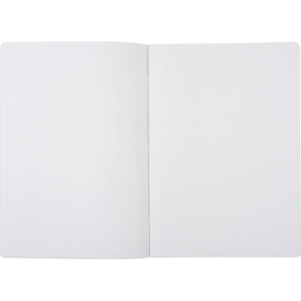 Un carnet ouvert avec des pages à carreaux.