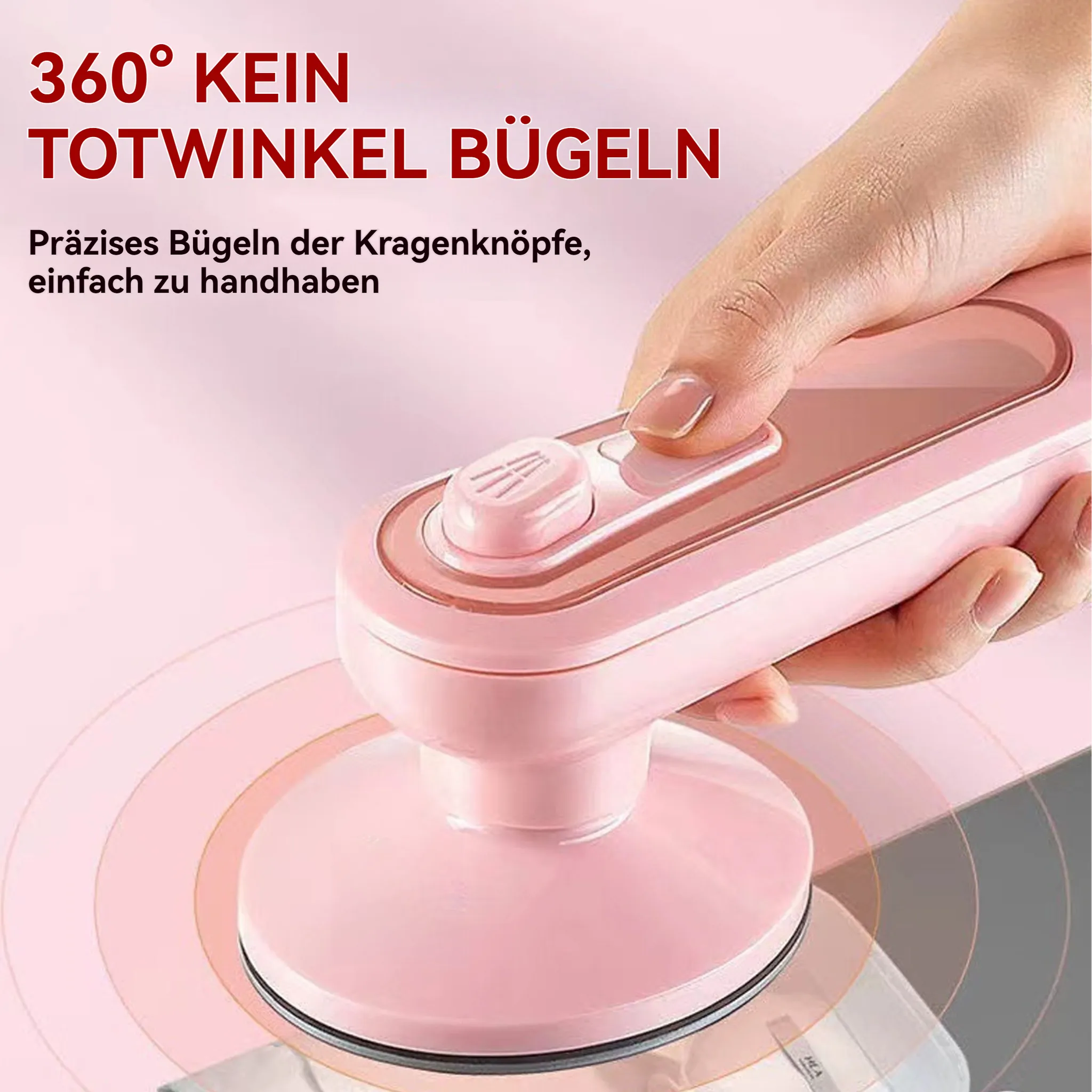 Eine Hand hält einen rosa Dampfbügeleisen, um Kleidung zu bügeln.