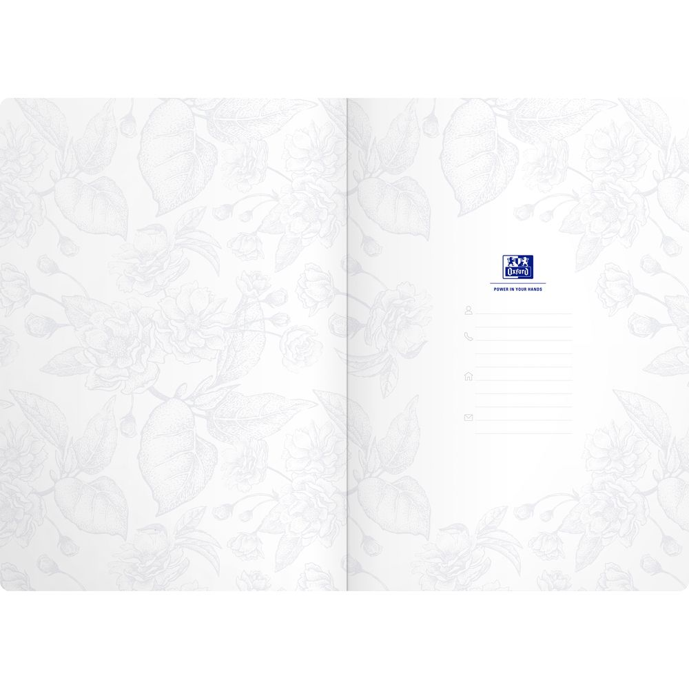 Pagine di taccuino aperte con delicato motivo floreale e logo Oxford.