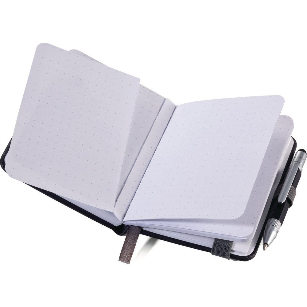 Ein offenes Notizbuch mit gepunkteten Seiten und einem Stifthalter.